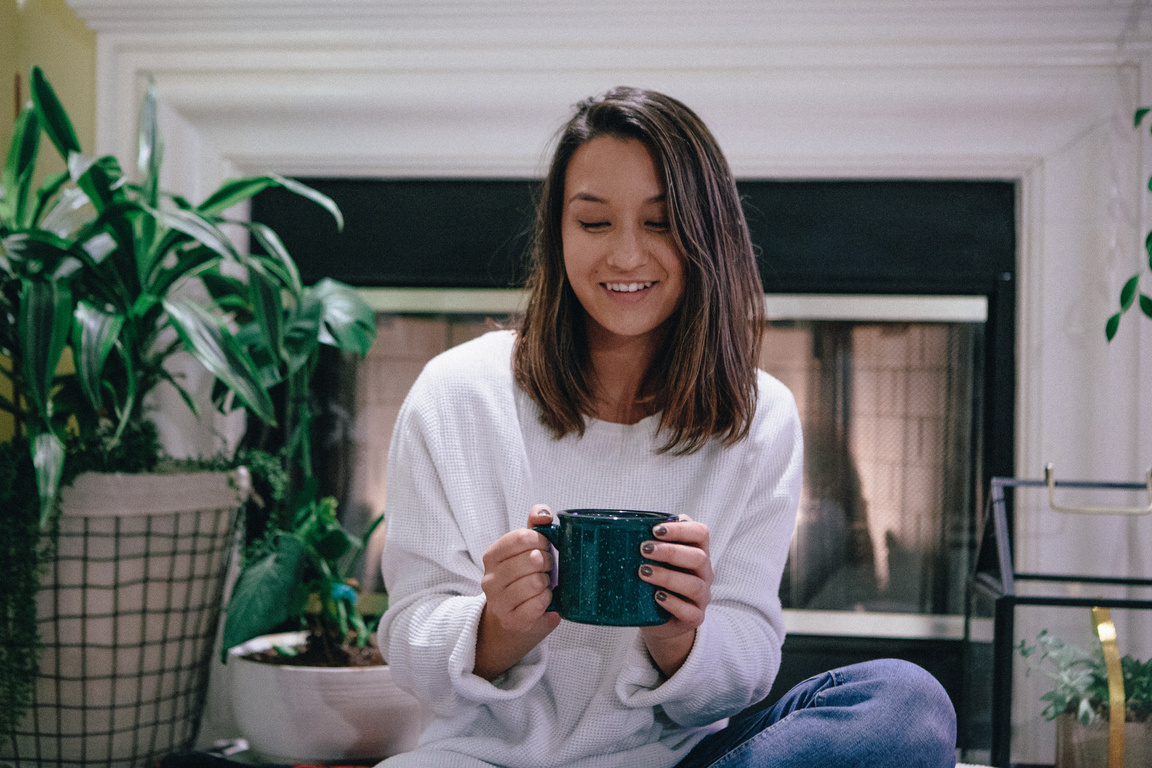 Woman Holding A Mug